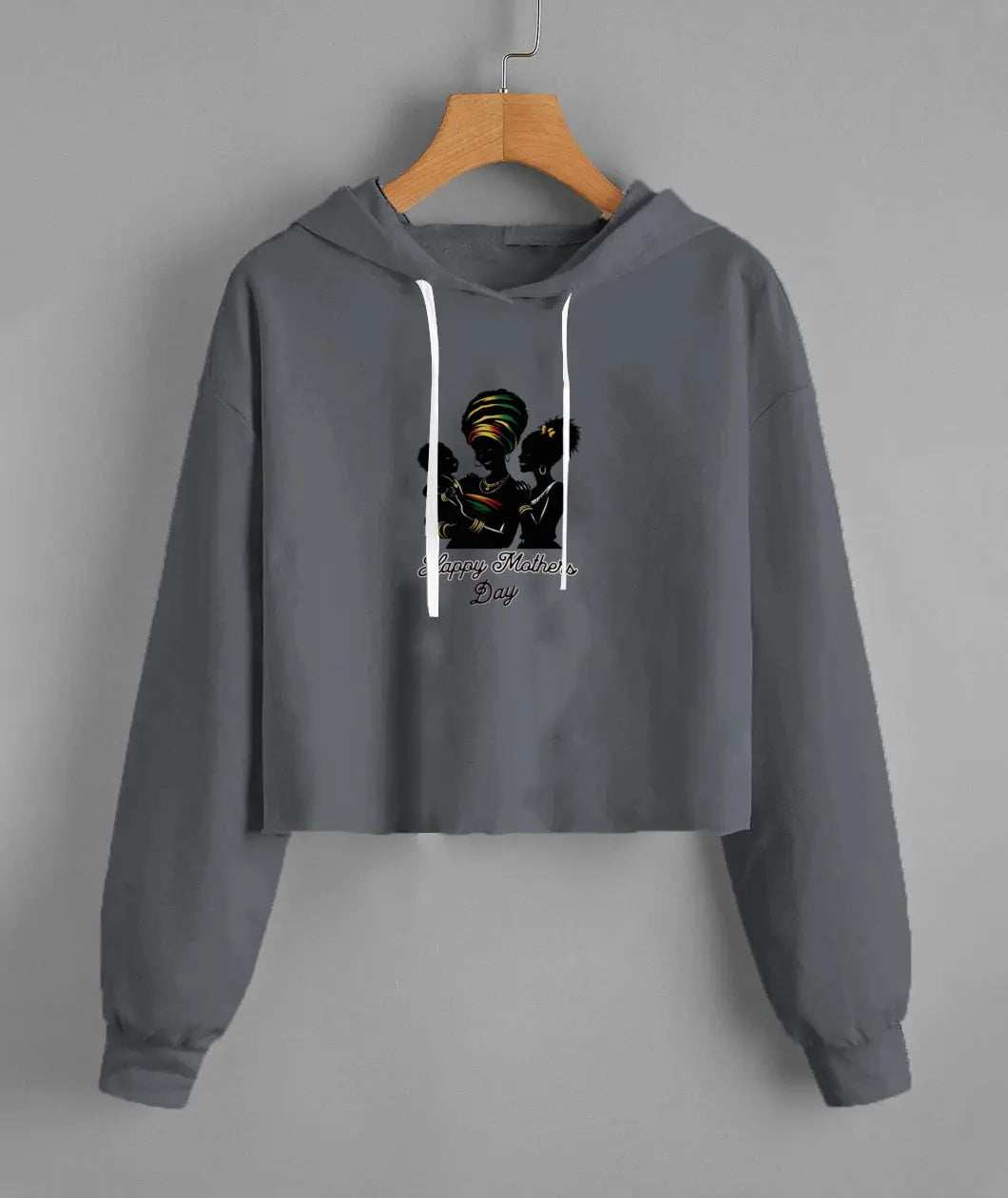 Grey Ladys fleece cropped hoodie with graphic print and white drawstrings hanging on wooden hanger against grey background