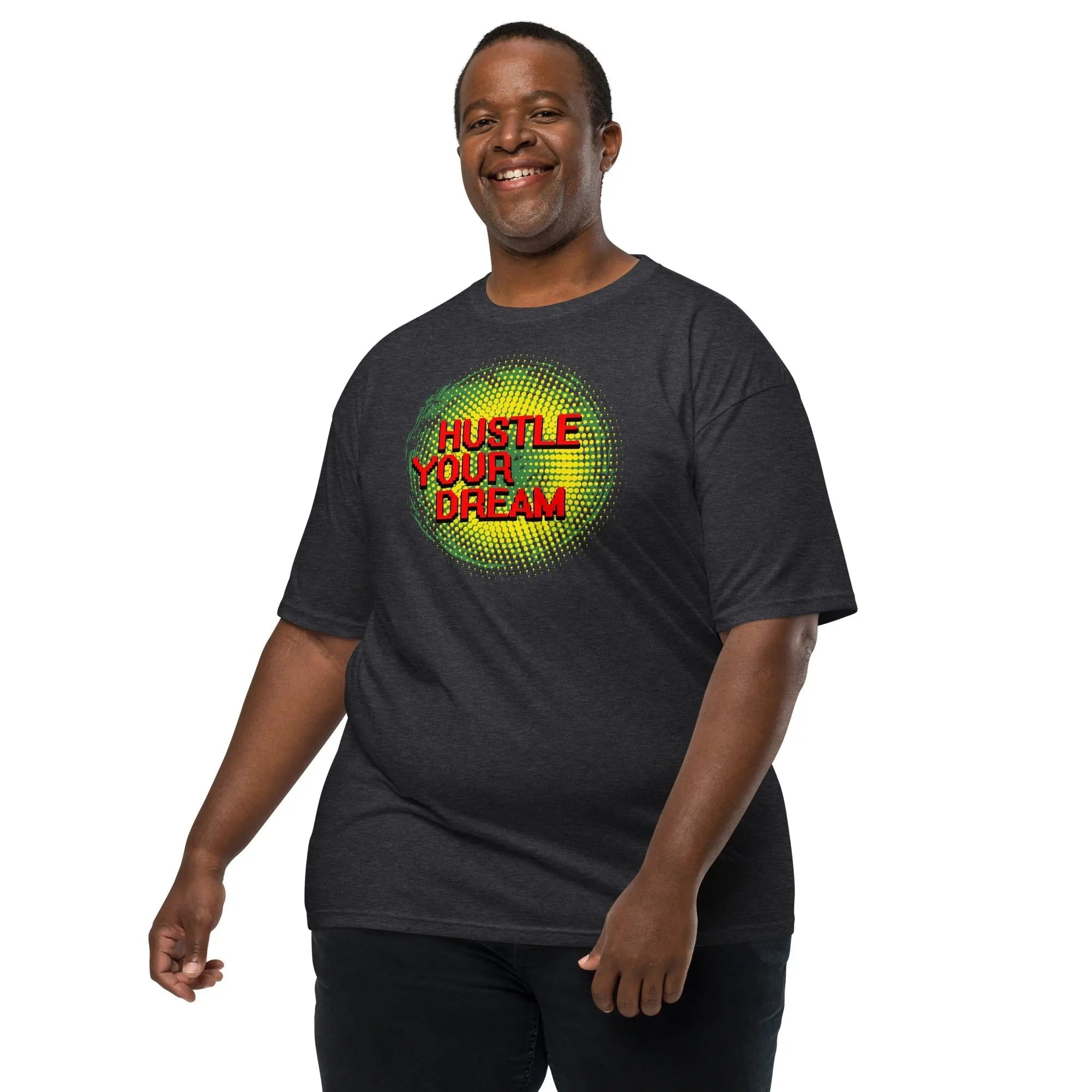 Man wearing Hustle Your Dream men's premium heavyweight charcoal tee with bold graphic text design