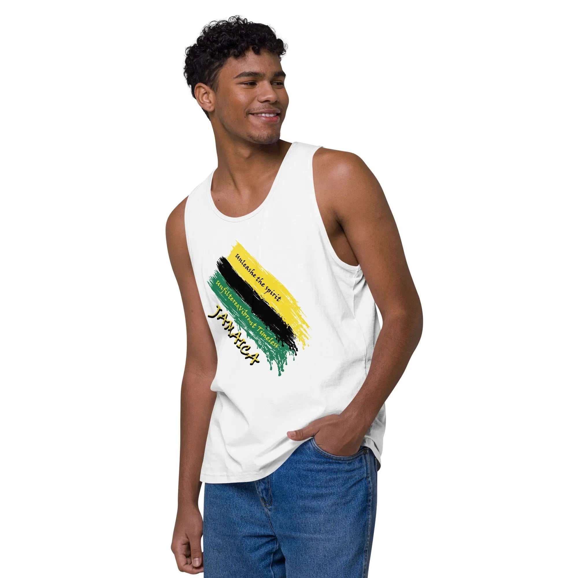 Raw Unfiltered Jamaica men’s tank top with bold black, green, and gold brushstroke design and inspirational text, worn by a smiling man in casual blue jeans.