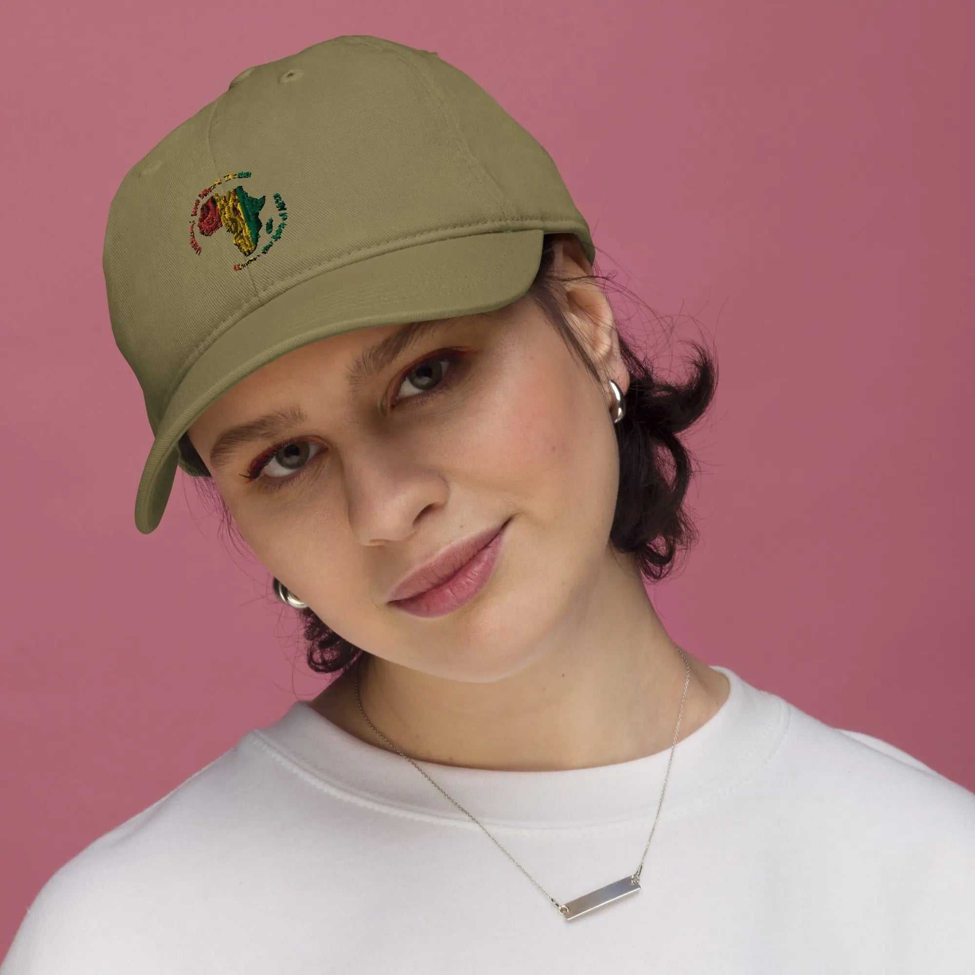 Woman wearing organic cotton Africa dad hat with embroidered African continent design