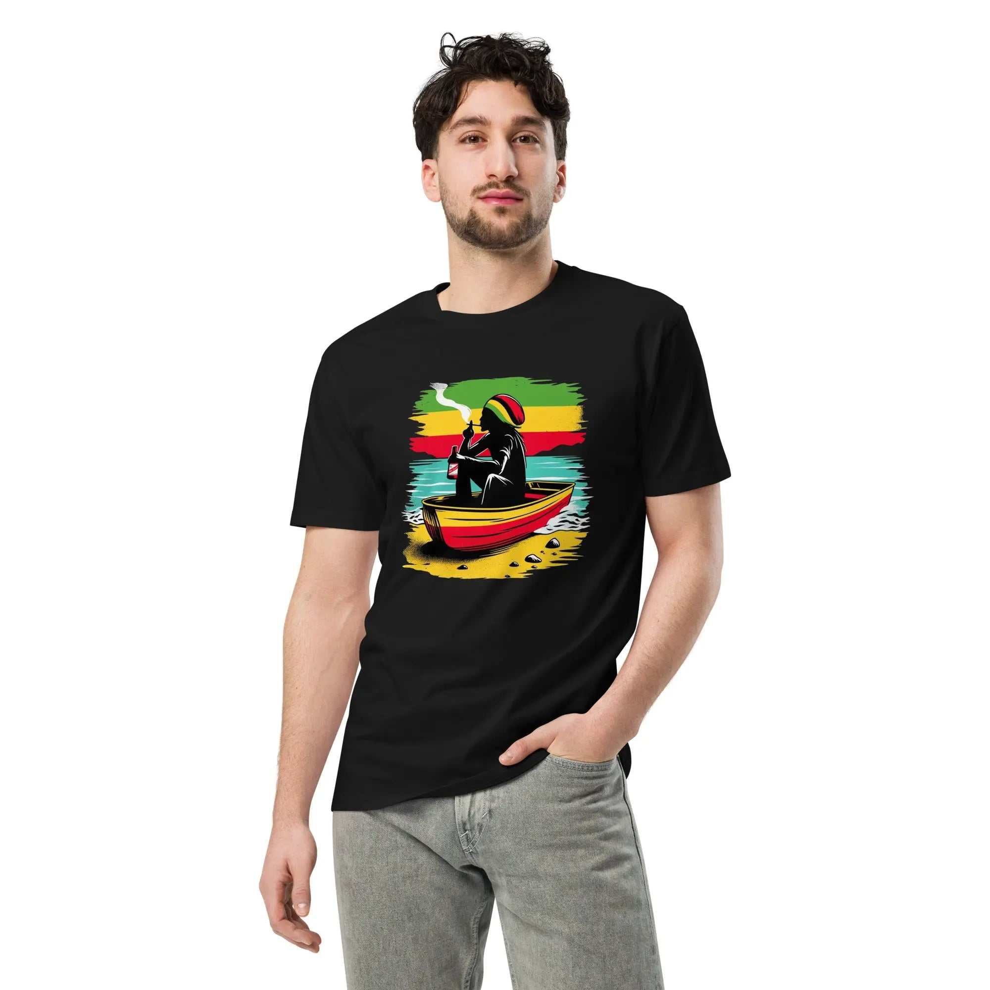 Man wearing black Island Vibes Cool Running’s T-Shirt with Rastafarian figure on red canoe and Jamaican flag colors background