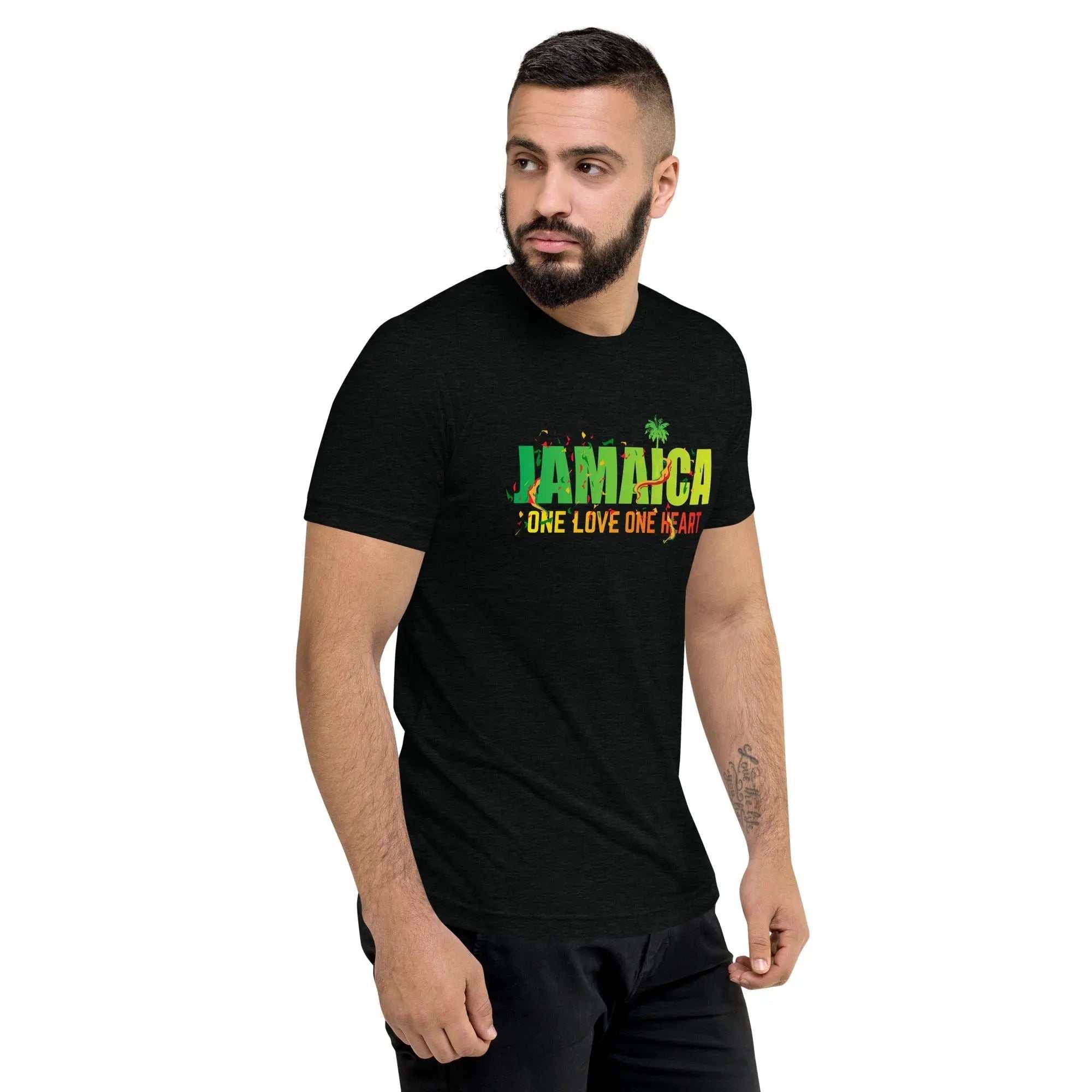 Man wearing black Jamaica One Love One Heart short sleeve unisex t-shirt with vintage design