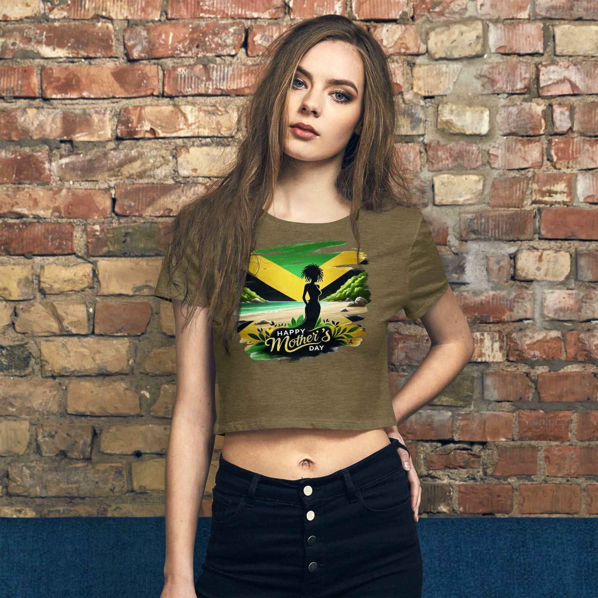 Mothers Day Women’s Crop Tee with slim fit and Happy Mother's Day graphic design on olive green fabric worn by model against brick wall background