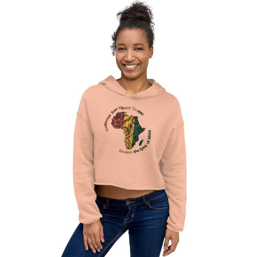 Woman wearing a pink Africa ladies crop hoodie with textured map and vibrant patterns