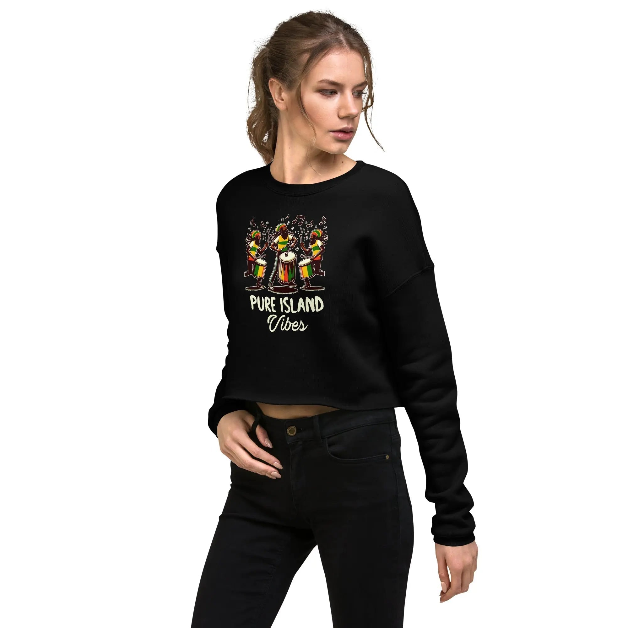 Woman wearing black Pure Island Vibes Crop Sweatshirt with colorful drummers graphic and text on front