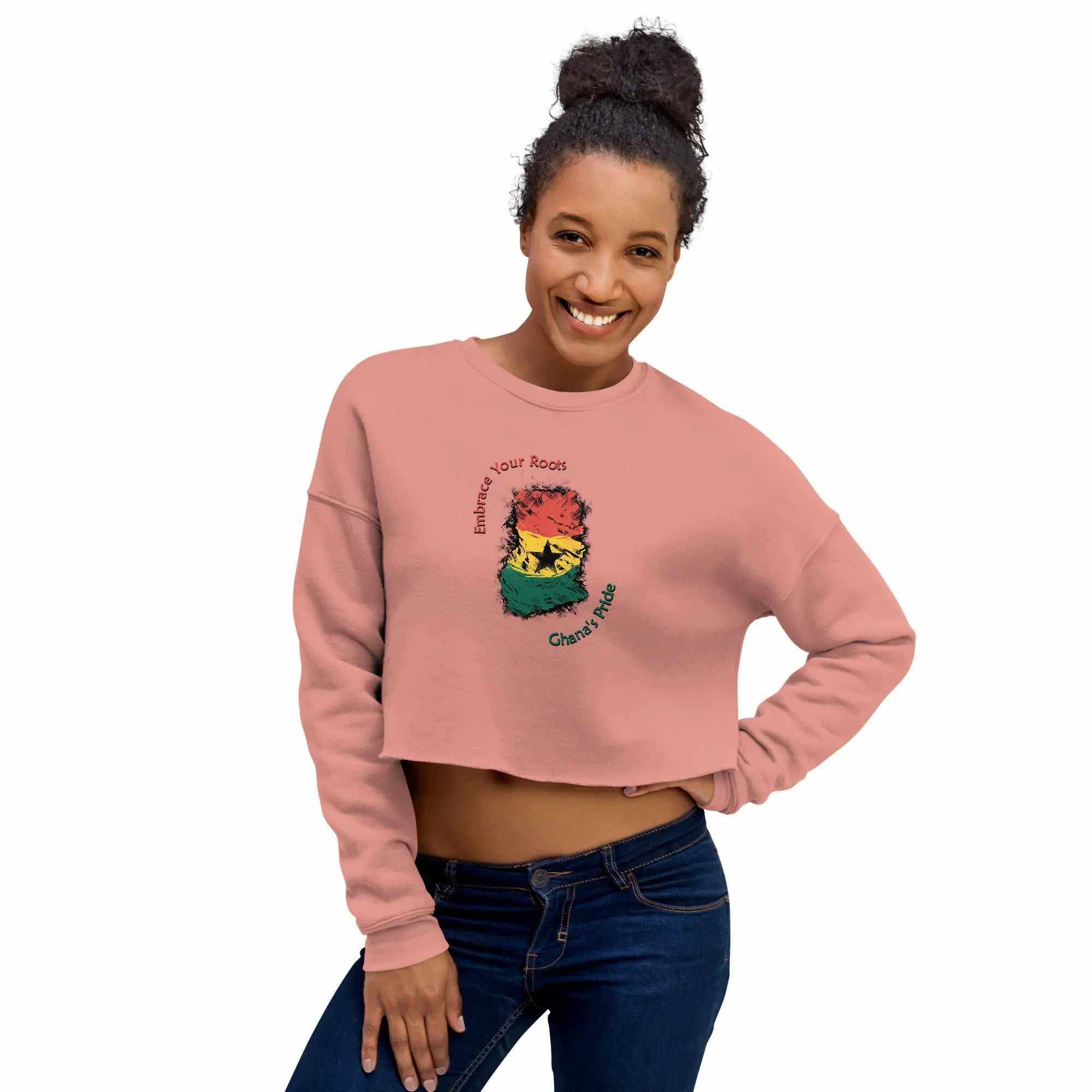 Woman wearing pink cropped sweatshirt with Ghana flag map and "Roots Of Ghana's Pride" design