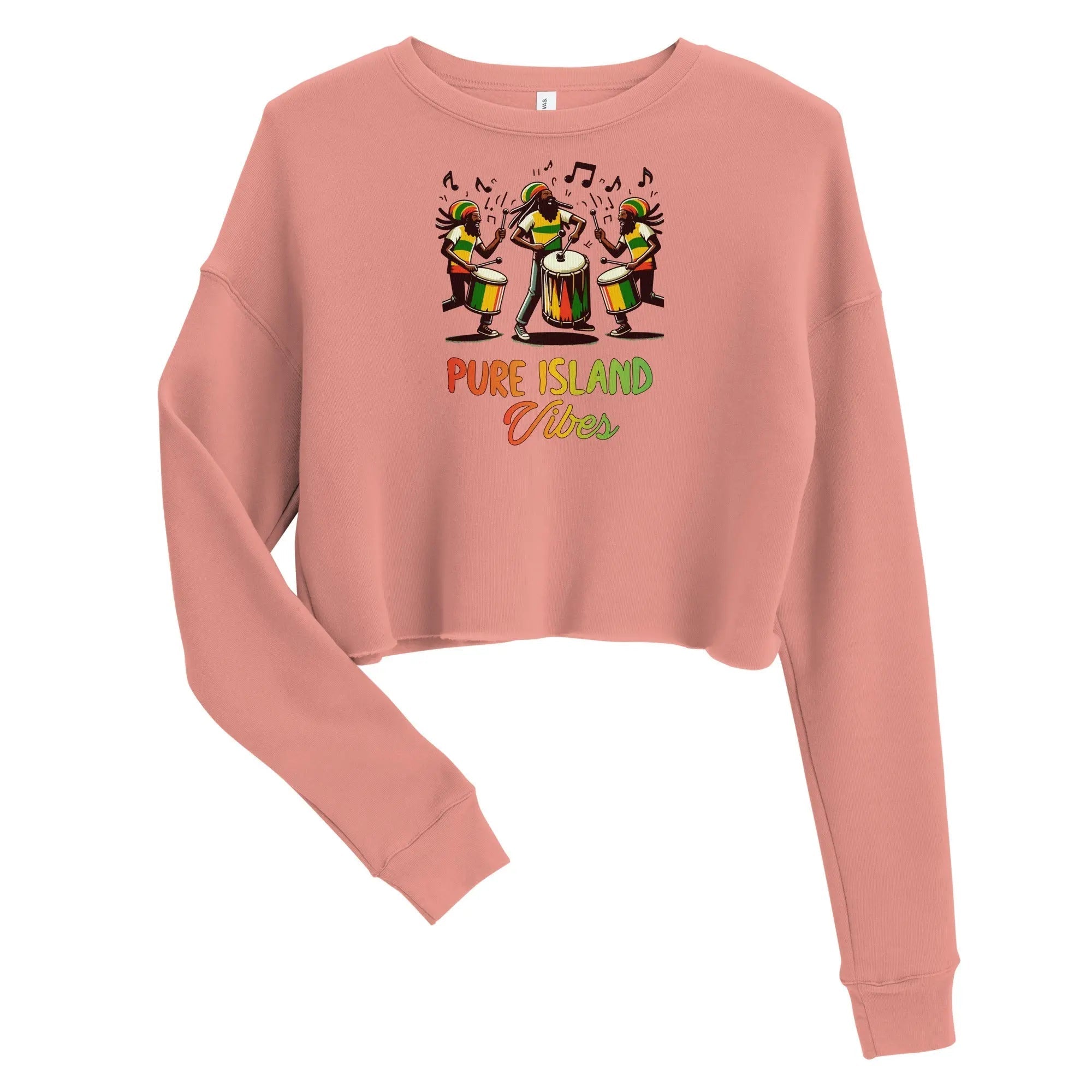 Pink cropped sweatshirt with vibrant Caribbean drummers and "Pure Island Vibes" text, casual and stylish design
